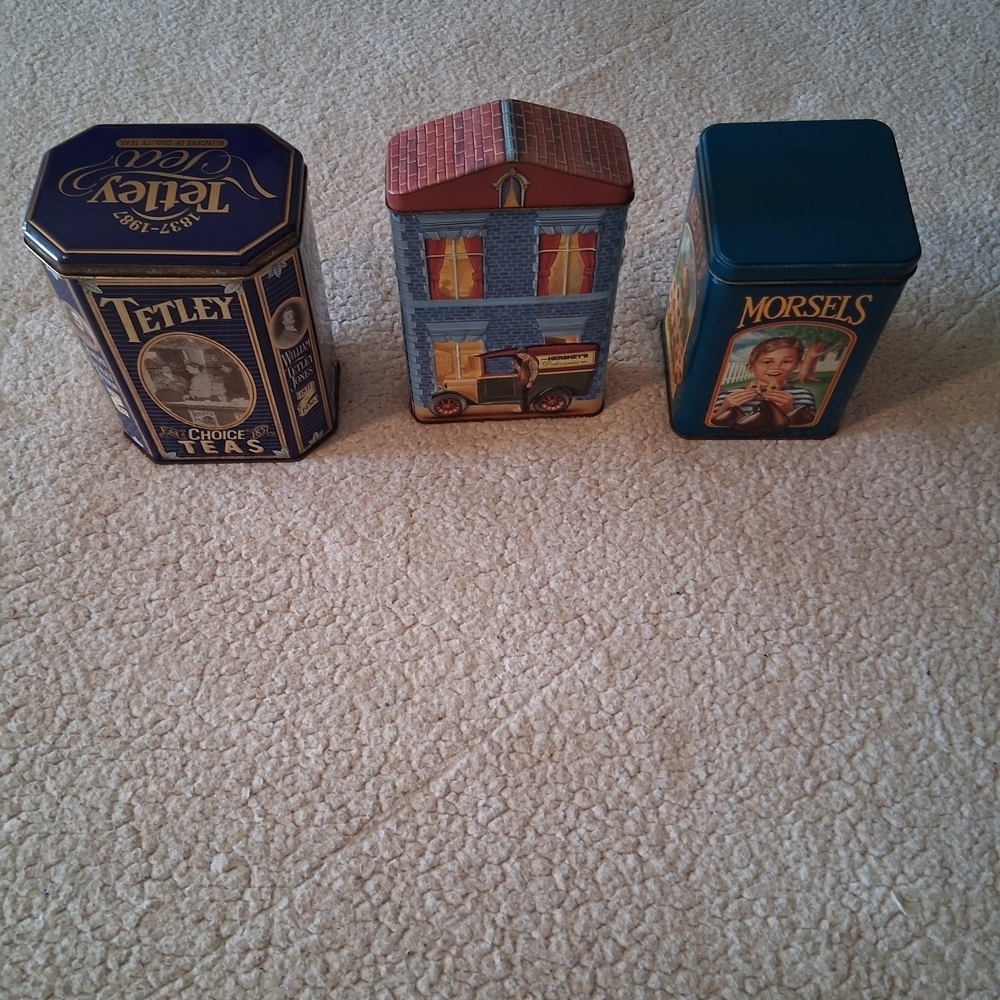 Lot Of 3 Vintage Tins - Tetley Tea, Nestle, And Hersheys Blue and Multicolor